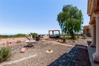 Step through 10-foot entry doors into vaulted ceilings  enjoy on Highland Falls Golf Club in Nevada - for sale on GolfHomes.com, golf home, golf lot