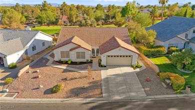 Charming one-story home located within an exclusive guard-gated on Los Prados Golf Course in Nevada - for sale on GolfHomes.com, golf home, golf lot