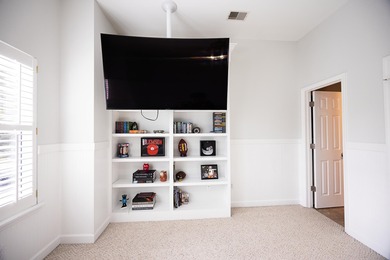 Welcome to the former model home of the reputable John Wieland on Dunes West Golf Club in South Carolina - for sale on GolfHomes.com, golf home, golf lot