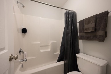 Welcome to the former model home of the reputable John Wieland on Dunes West Golf Club in South Carolina - for sale on GolfHomes.com, golf home, golf lot