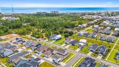 Relax and unwind while watching sunsets from your charming front on Holiday Golf Club in Florida - for sale on GolfHomes.com, golf home, golf lot