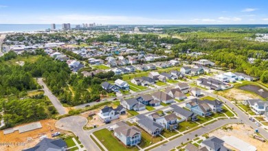 Relax and unwind while watching sunsets from your charming front on Holiday Golf Club in Florida - for sale on GolfHomes.com, golf home, golf lot