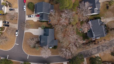 Welcome to the former model home of the reputable John Wieland on Dunes West Golf Club in South Carolina - for sale on GolfHomes.com, golf home, golf lot