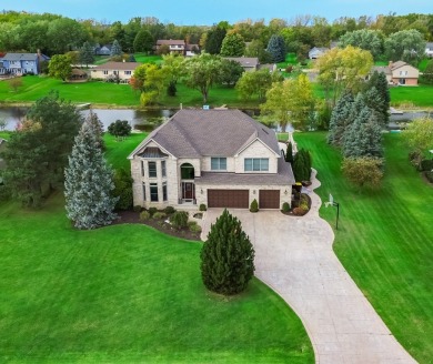 Resort-style living awaits in this 5,779 sf custom-built home in on Prairie Isle Golf Course in Illinois - for sale on GolfHomes.com, golf home, golf lot