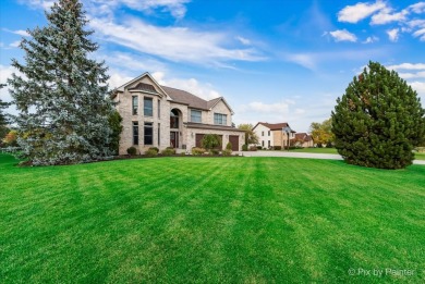 Resort-style living awaits in this 5,779 sf custom-built home in on Prairie Isle Golf Course in Illinois - for sale on GolfHomes.com, golf home, golf lot