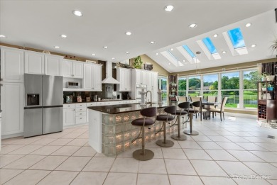 Resort-style living awaits in this 5,779 sf custom-built home in on Prairie Isle Golf Course in Illinois - for sale on GolfHomes.com, golf home, golf lot