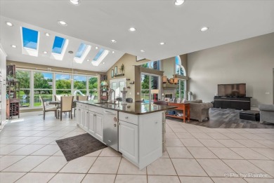 Resort-style living awaits in this 5,779 sf custom-built home in on Prairie Isle Golf Course in Illinois - for sale on GolfHomes.com, golf home, golf lot