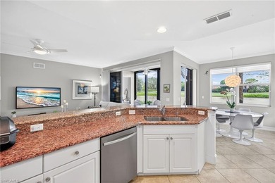 Tastefully updated first floor coach home is now available in on Pelican Sound Golf and River Club in Florida - for sale on GolfHomes.com, golf home, golf lot