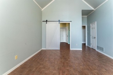 This charming 4-bedroom, 2.5-bath home overlooking the 15th tee on Thorntree Country Club in Texas - for sale on GolfHomes.com, golf home, golf lot