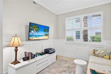 Tastefully updated first floor coach home is now available in on Pelican Sound Golf and River Club in Florida - for sale on GolfHomes.com, golf home, golf lot