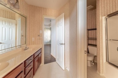 This charming 4-bedroom, 2.5-bath home overlooking the 15th tee on Thorntree Country Club in Texas - for sale on GolfHomes.com, golf home, golf lot