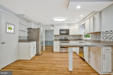 This lovingly maintained Dutch Colonial home offers timeless on Bay Hills Golf Club in Maryland - for sale on GolfHomes.com, golf home, golf lot