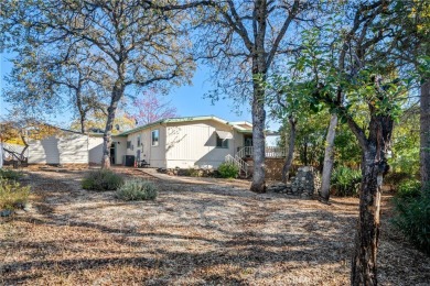 Welcome to your dream home! This beautifully updated 2-bedroom on Lake Oroville Golf and Event Center in California - for sale on GolfHomes.com, golf home, golf lot