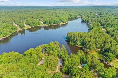 You will FEEL the difference! This One Level custom home has so on River Golf and County Club at Lake Royale in North Carolina - for sale on GolfHomes.com, golf home, golf lot