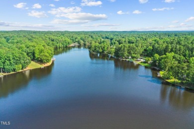 You will FEEL the difference! This One Level custom home has so on River Golf and County Club at Lake Royale in North Carolina - for sale on GolfHomes.com, golf home, golf lot