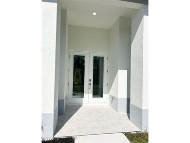 Gorgeous corner lot home. 3 bedrooms 3 full bathrooms, 2 car on Lehigh Resort Club in Florida - for sale on GolfHomes.com, golf home, golf lot