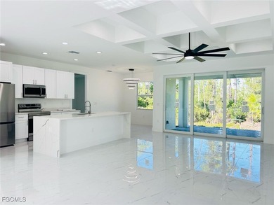 Gorgeous corner lot home. 3 bedrooms 3 full bathrooms, 2 car on Lehigh Resort Club in Florida - for sale on GolfHomes.com, golf home, golf lot