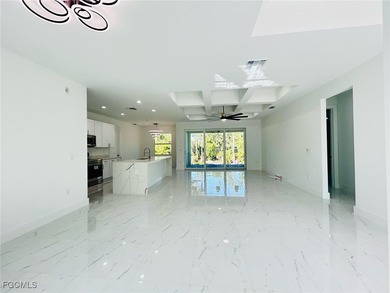 Gorgeous corner lot home. 3 bedrooms 3 full bathrooms, 2 car on Lehigh Resort Club in Florida - for sale on GolfHomes.com, golf home, golf lot