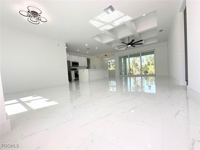 Gorgeous corner lot home. 3 bedrooms 3 full bathrooms, 2 car on Lehigh Resort Club in Florida - for sale on GolfHomes.com, golf home, golf lot