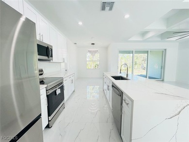 Gorgeous corner lot home. 3 bedrooms 3 full bathrooms, 2 car on Lehigh Resort Club in Florida - for sale on GolfHomes.com, golf home, golf lot