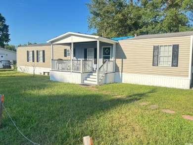 Welcome to Your Ideal Home in Myrtle Beach: Delightful 2 Bedroom on Whispering Pines in South Carolina - for sale on GolfHomes.com, golf home, golf lot