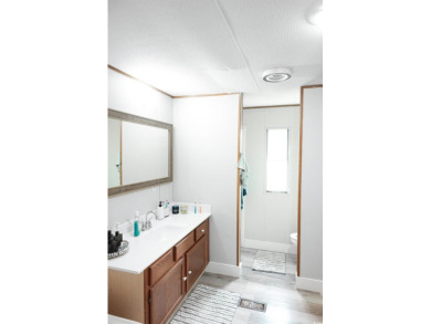 Welcome to Your Ideal Home in Myrtle Beach: Delightful 2 Bedroom on Whispering Pines in South Carolina - for sale on GolfHomes.com, golf home, golf lot