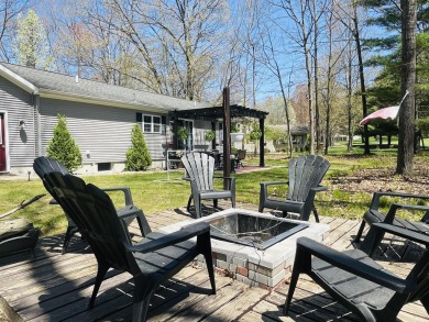 Looking for a turn-key home, ready day one? Welcome to 9612 on Canadian Lakes Country Club-The Royal Course in Michigan - for sale on GolfHomes.com, golf home, golf lot