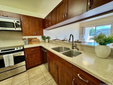 Welcome to Village on the Green, where comfort meets convenience on Waikele Golf Club in Hawaii - for sale on GolfHomes.com, golf home, golf lot