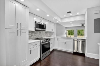 THIS BEAUTIFUL TOWNHOUSE, IS TOTALLY REVOVATED AND MOVE IN on Deer Creek Golf Club in Florida - for sale on GolfHomes.com, golf home, golf lot