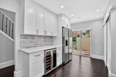 THIS BEAUTIFUL TOWNHOUSE, IS TOTALLY REVOVATED AND MOVE IN on Deer Creek Golf Club in Florida - for sale on GolfHomes.com, golf home, golf lot
