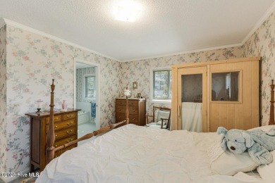 Your Dream Sunset Beach Cottage is here! Come now to view this on Oyster Bay Golf Links in North Carolina - for sale on GolfHomes.com, golf home, golf lot