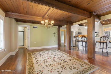 Frank Lloyd Wright-Inspired Mid-Century Modern Masterpiece on on Colonial Country Club Deerfield in Mississippi - for sale on GolfHomes.com, golf home, golf lot