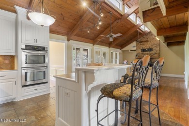 Frank Lloyd Wright-Inspired Mid-Century Modern Masterpiece on on Colonial Country Club Deerfield in Mississippi - for sale on GolfHomes.com, golf home, golf lot