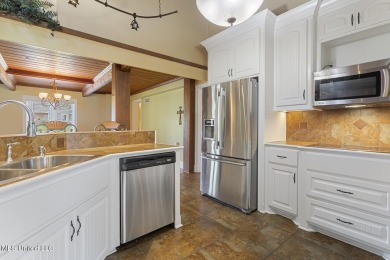 Frank Lloyd Wright-Inspired Mid-Century Modern Masterpiece on on Colonial Country Club Deerfield in Mississippi - for sale on GolfHomes.com, golf home, golf lot