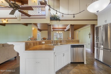Frank Lloyd Wright-Inspired Mid-Century Modern Masterpiece on on Colonial Country Club Deerfield in Mississippi - for sale on GolfHomes.com, golf home, golf lot
