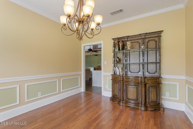 Frank Lloyd Wright-Inspired Mid-Century Modern Masterpiece on on Colonial Country Club Deerfield in Mississippi - for sale on GolfHomes.com, golf home, golf lot