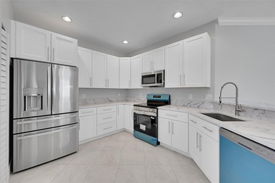 Completely renovated and move-in ready! Welcome to Segovia on Boca Dunes Golf and Country Club in Florida - for sale on GolfHomes.com, golf home, golf lot