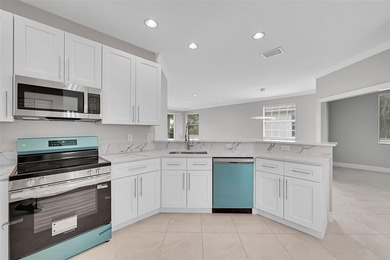 Completely renovated and move-in ready! Welcome to Segovia on Boca Dunes Golf and Country Club in Florida - for sale on GolfHomes.com, golf home, golf lot