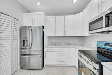 Completely renovated and move-in ready! Welcome to Segovia on Boca Dunes Golf and Country Club in Florida - for sale on GolfHomes.com, golf home, golf lot