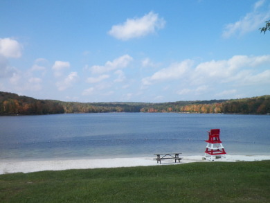 Lake view on a double lot on Treasure Lake - Gold in Pennsylvania - for sale on GolfHomes.com, golf home, golf lot