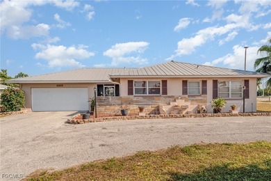 Luxury, Location, and Lifestyle-This Home Has It All! Discover on Port Charlotte Golf Club in Florida - for sale on GolfHomes.com, golf home, golf lot
