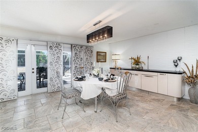 Luxury, Location, and Lifestyle-This Home Has It All! Discover on Port Charlotte Golf Club in Florida - for sale on GolfHomes.com, golf home, golf lot