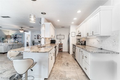 Luxury, Location, and Lifestyle-This Home Has It All! Discover on Port Charlotte Golf Club in Florida - for sale on GolfHomes.com, golf home, golf lot