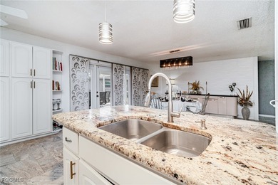 Luxury, Location, and Lifestyle-This Home Has It All! Discover on Port Charlotte Golf Club in Florida - for sale on GolfHomes.com, golf home, golf lot