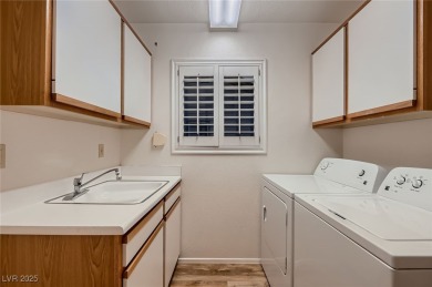 Welcome to this charming two-bedroom home in Sun City Summerlin! on Highland Falls Golf Club in Nevada - for sale on GolfHomes.com, golf home, golf lot