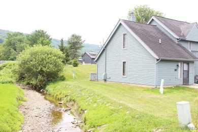 Explore the inviting charm of this beautifully appointed on Holiday Valley Resort in New York - for sale on GolfHomes.com, golf home, golf lot