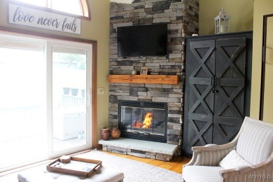 Explore the inviting charm of this beautifully appointed on Holiday Valley Resort in New York - for sale on GolfHomes.com, golf home, golf lot