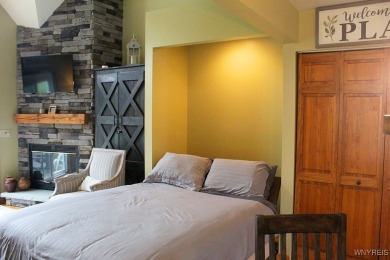 Explore the inviting charm of this beautifully appointed on Holiday Valley Resort in New York - for sale on GolfHomes.com, golf home, golf lot