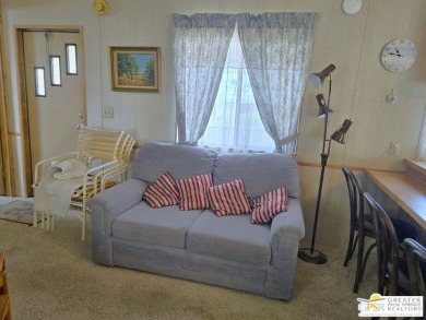 Located in a beautiful countryside setting at the entry to the on Desert Crest Country Club in California - for sale on GolfHomes.com, golf home, golf lot