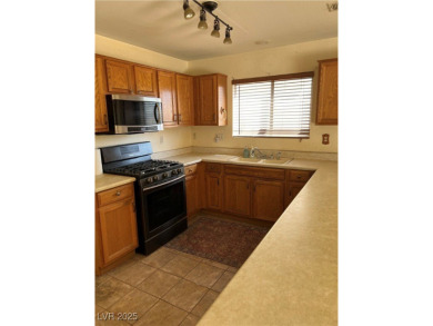 GREAT POTENTIAL 2 STORY/4 BEDROOM 2.5 BATH HOUSE * LARGE KITCHEN on Los Prados Golf Course in Nevada - for sale on GolfHomes.com, golf home, golf lot